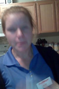 a beautiful older woman with a big ass and stockings is fucking her pussy